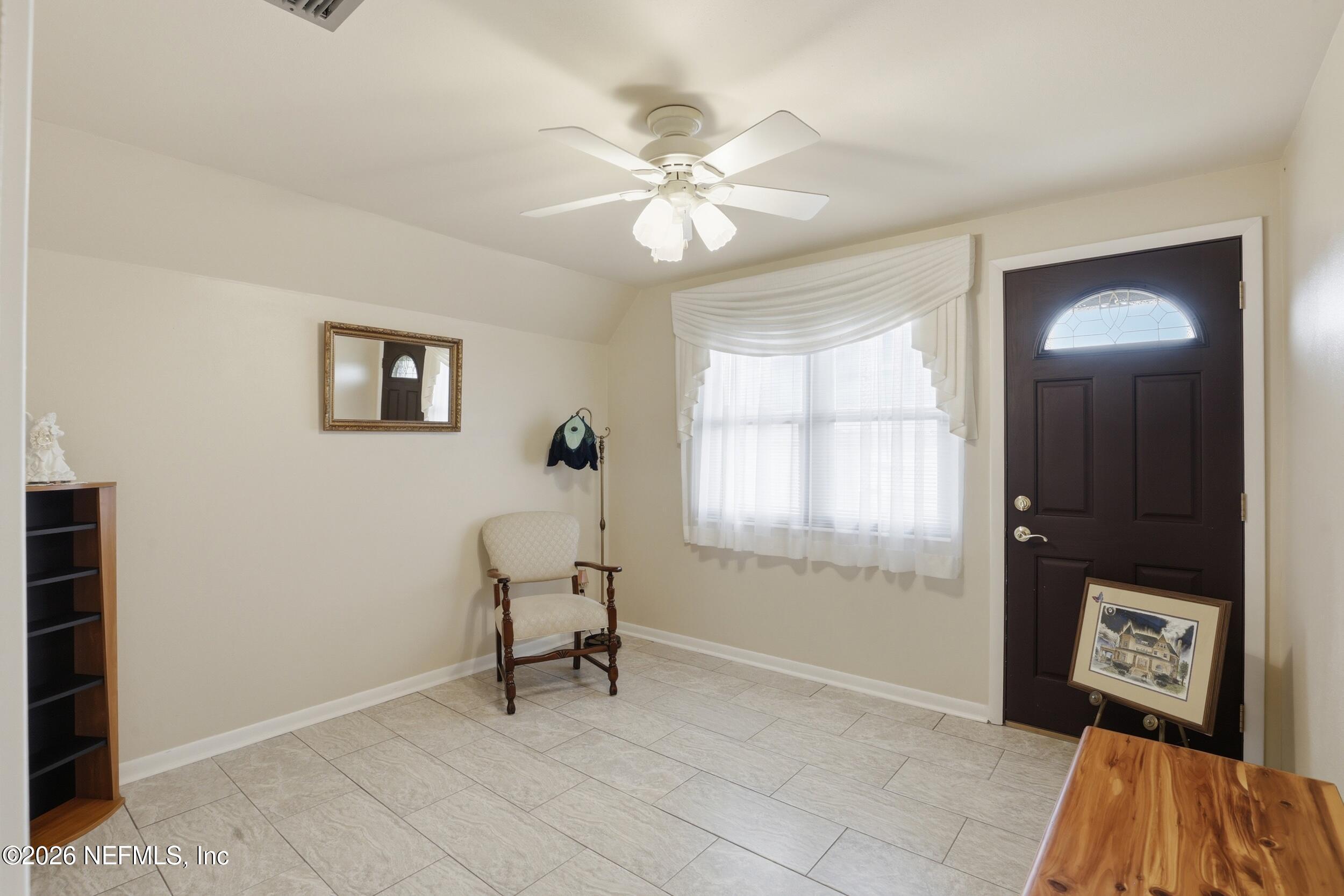 295 Northwest Berea Avenue Keystone Heights, FL 32656 - Photo 20 of 49 a view of room with window and a ceiling fan