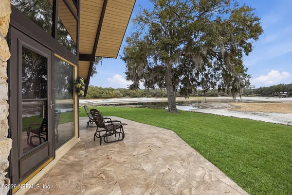 a bench sitting in the middle of a park