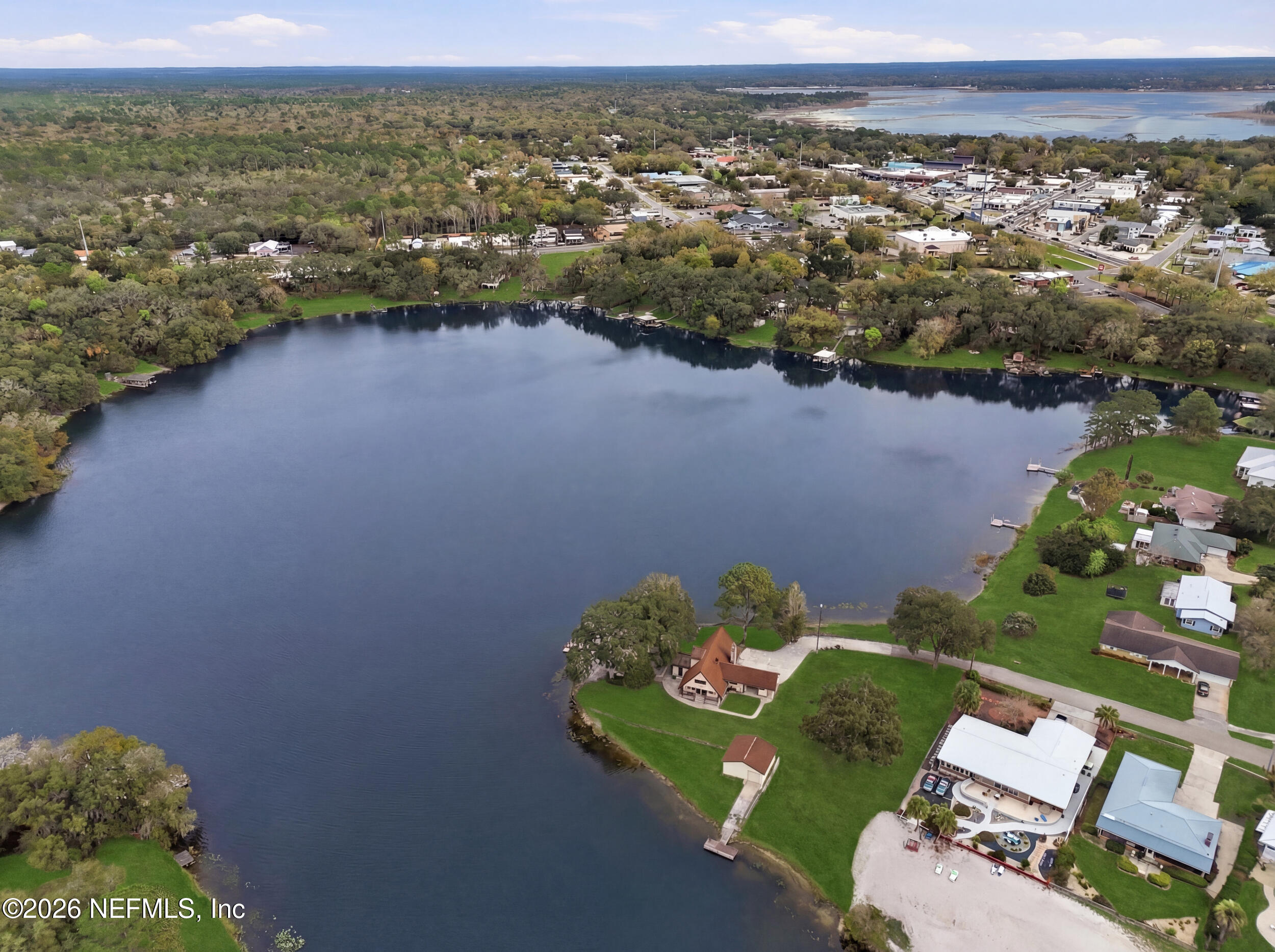 295 Northwest Berea Avenue Keystone Heights, FL 32656 - Photo 48 of 49 an aerial view of a house with a lake view