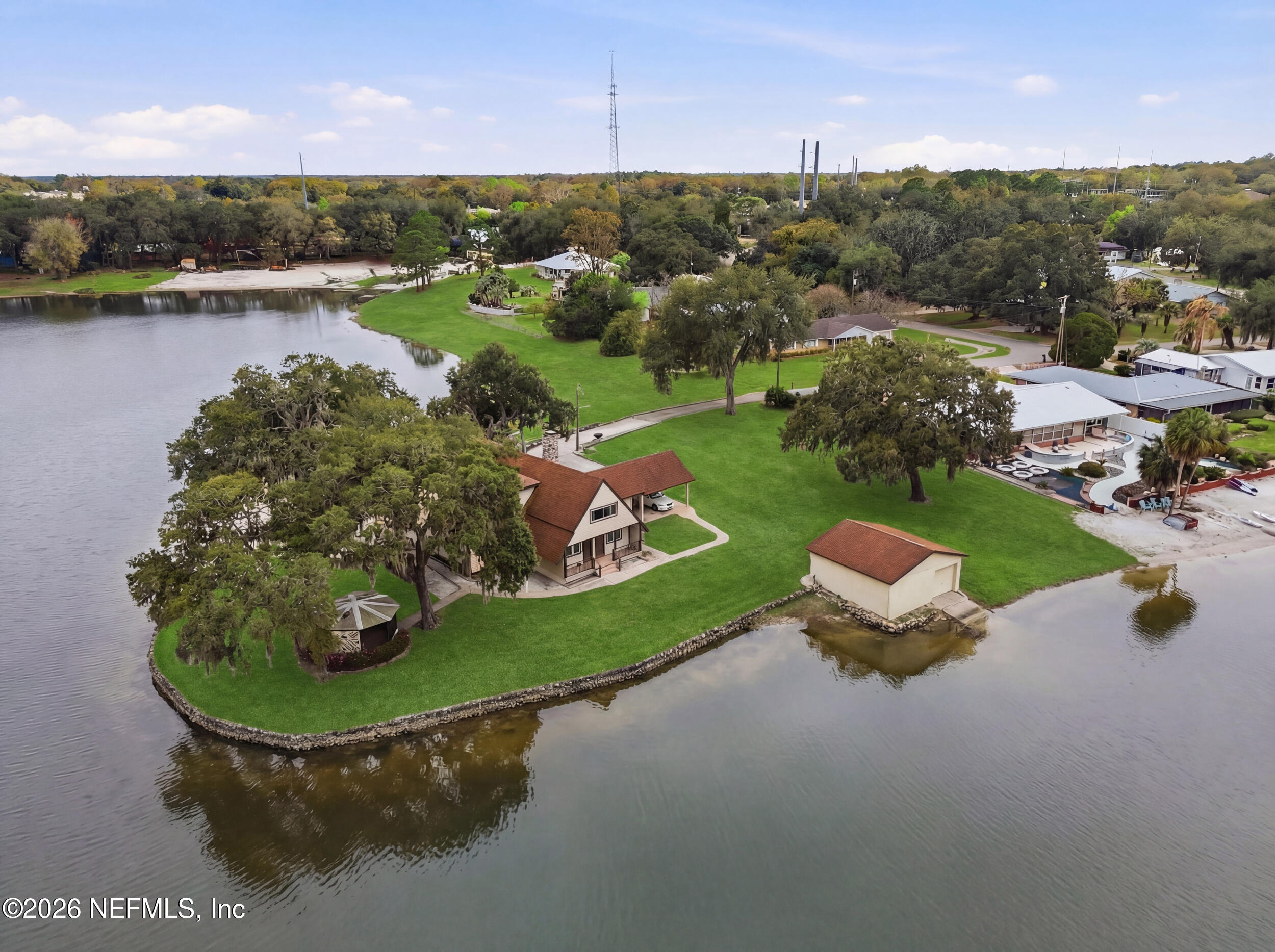 295 Northwest Berea Avenue Keystone Heights, FL 32656 - Photo 49 of 49 an aerial view of a house with lake view