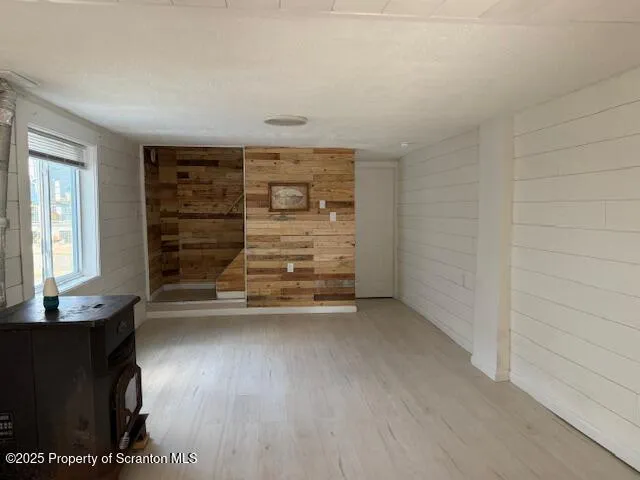 a view of room with stairs and a window