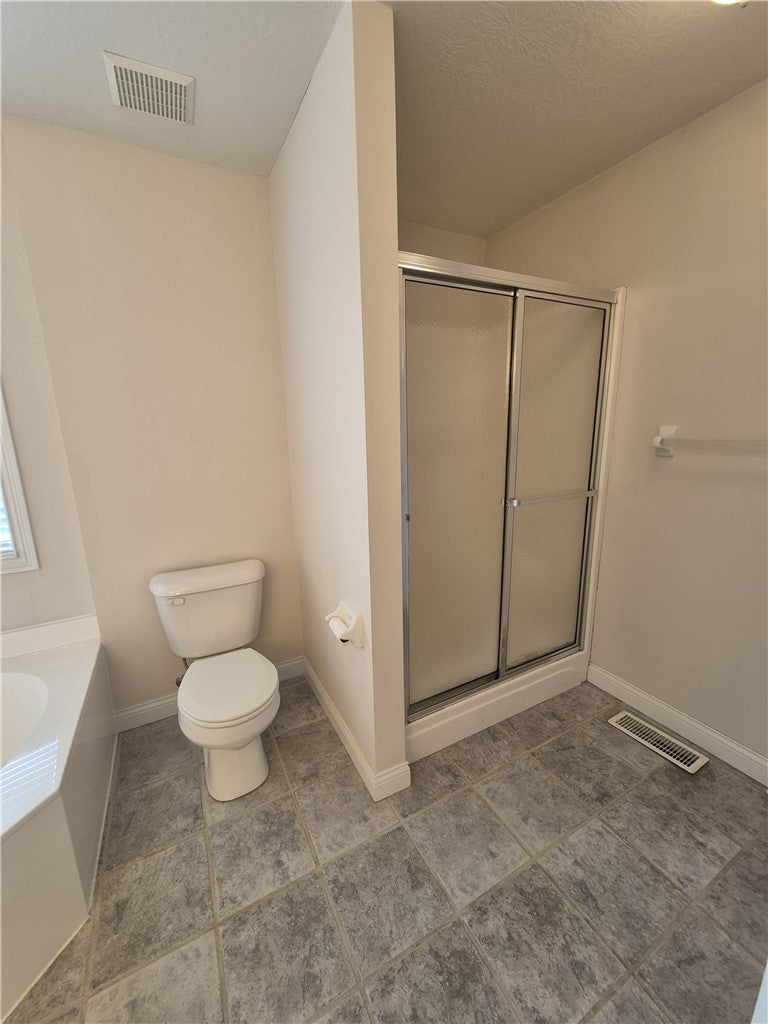 633 Orient Way Hamilton, OH 45013 - Photo 52 of 68 This bathroom features a sleek shower and durable tile flooring for everyday comfort.
