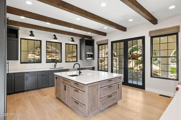 a kitchen with a stove and a refrigerator