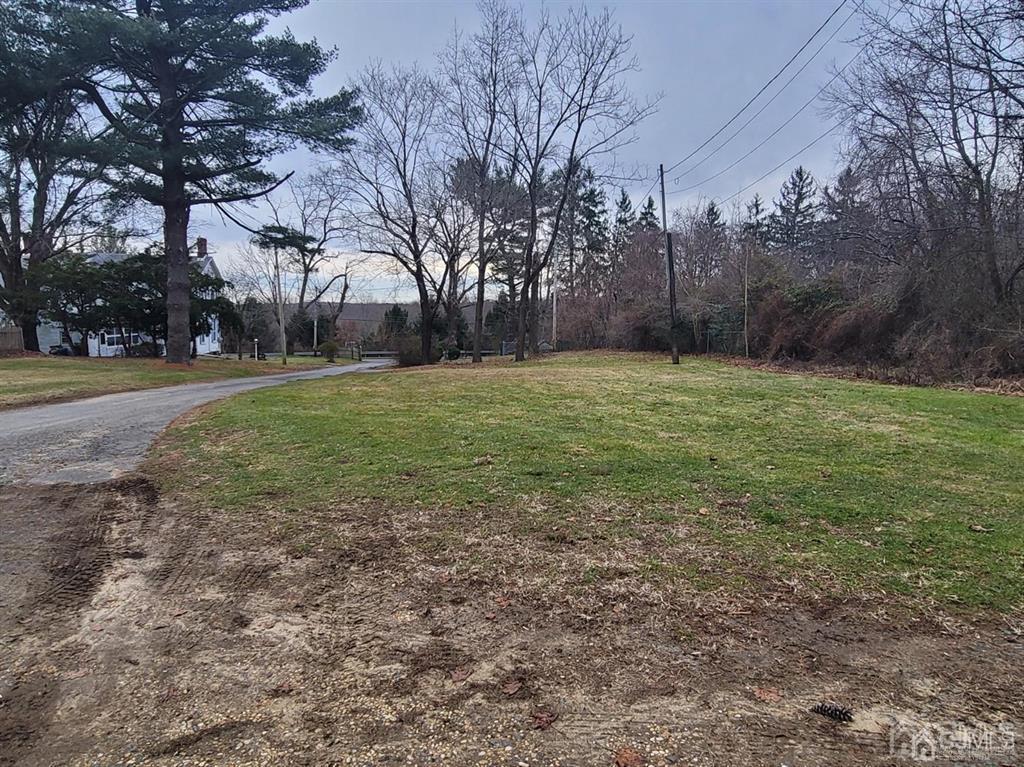 302 Schoolhouse Road, Unit B Monroe Township, NJ 08831 - Photo 8 of 8 a view of a field with trees