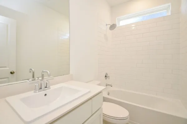 a bathroom with a sink toilet and bathtub