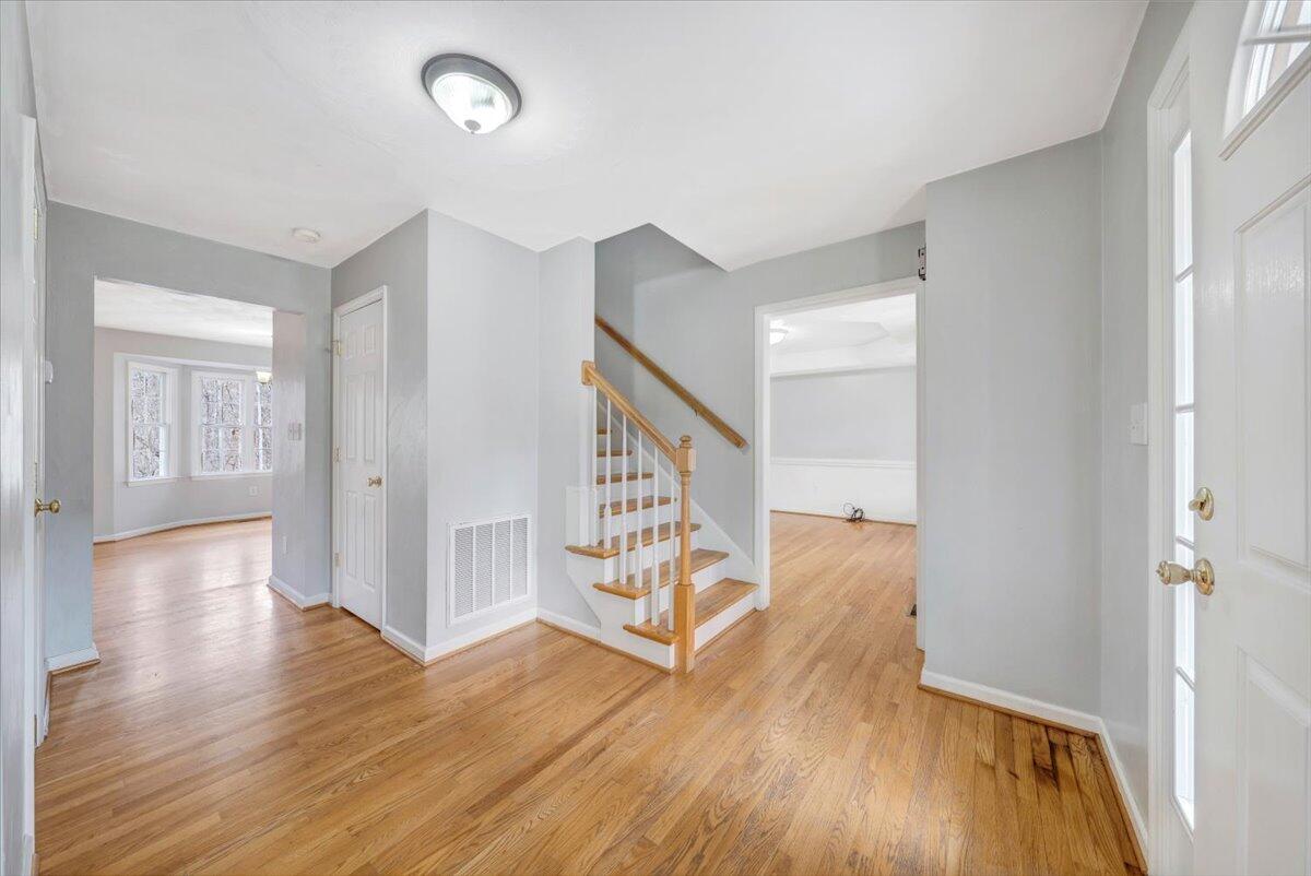 1063 Archway Road Blue Ridge, VA 24064 - Photo 3 of 46 a view of entryway with wooden floor