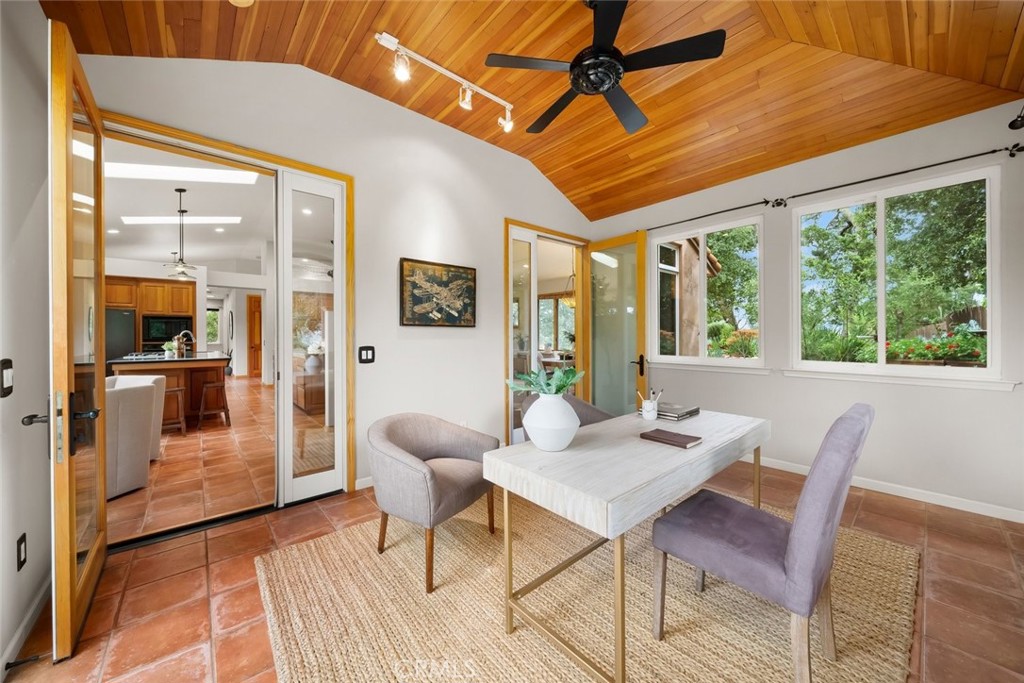 5982 Violeta Avenue Atascadero, CA 93422 - Photo 17 of 75 a dining room with furniture a chandelier and wooden floor