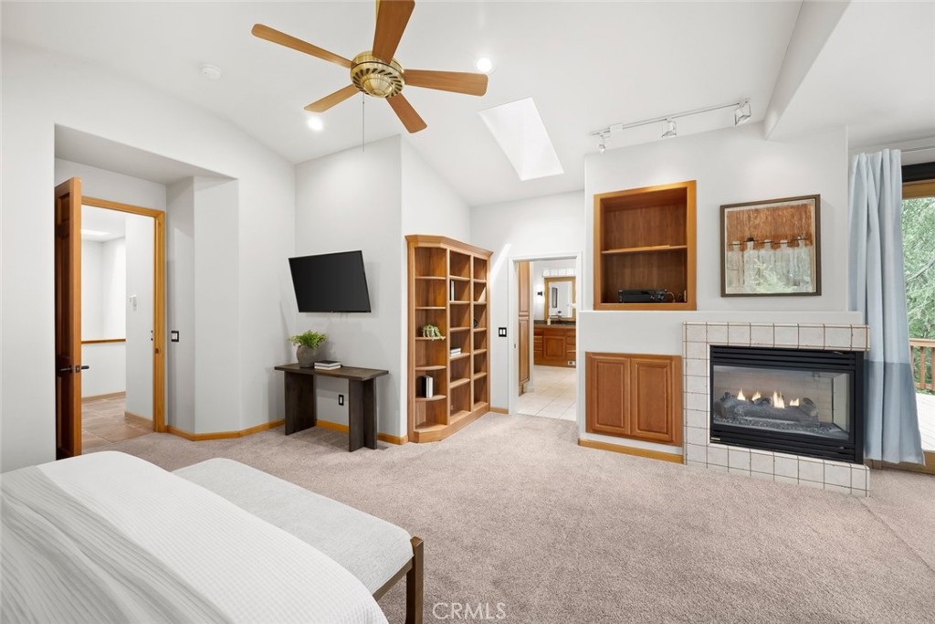5982 Violeta Avenue Atascadero, CA 93422 - Photo 24 of 75 a bedroom with a bed and a flat screen tv