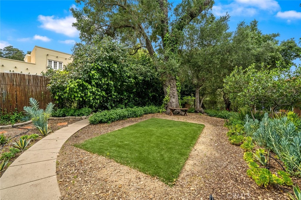 5982 Violeta Avenue Atascadero, CA 93422 - Photo 39 of 75 a view of a garden with a building in the background