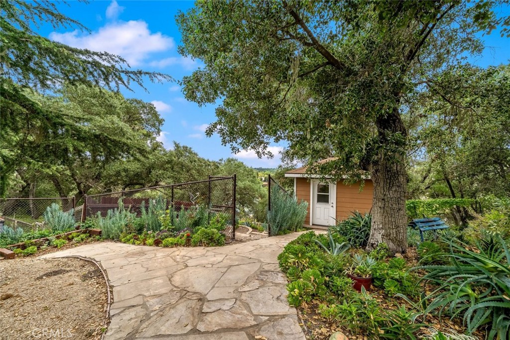 5982 Violeta Avenue Atascadero, CA 93422 - Photo 43 of 75 a front view of a house with a yard and garage