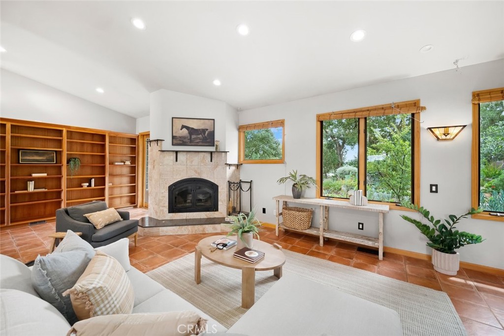 5982 Violeta Avenue Atascadero, CA 93422 - Photo 5 of 75 a living room with furniture large window and fireplace