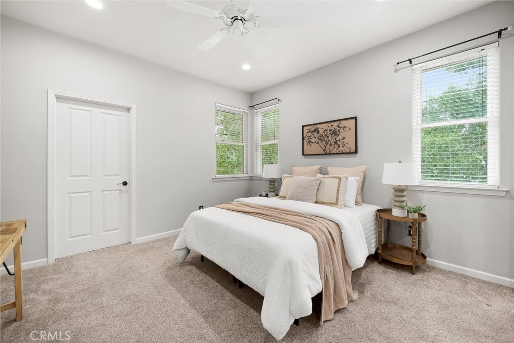 5982 Violeta Avenue Atascadero, CA 93422 - Photo 60 of 75 a bedroom with a bed and a window