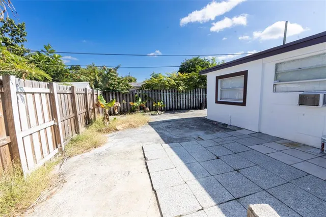 a view of a pathway with a yard