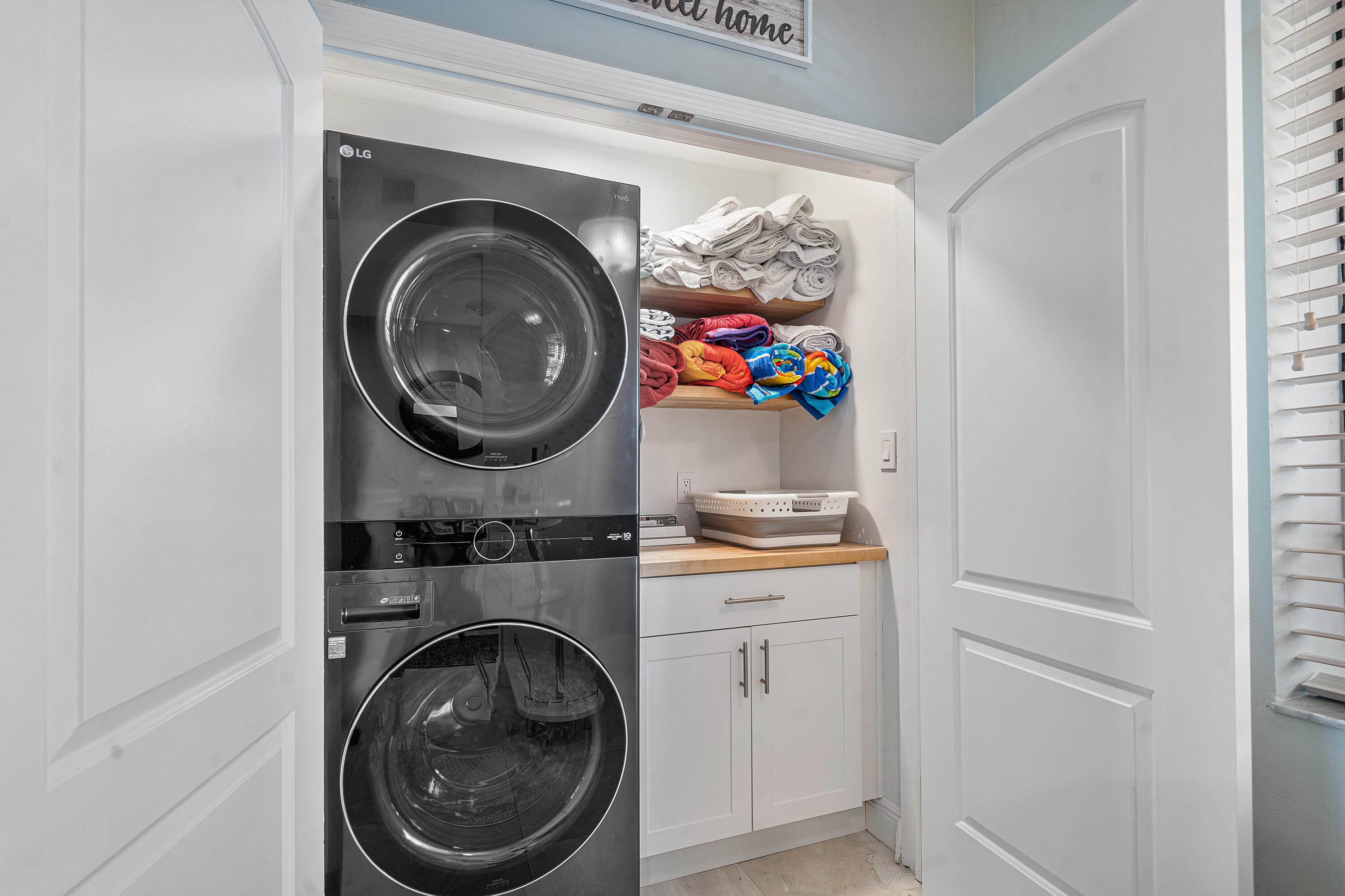 200 Waterway Road, Unit 204 Tequesta, FL 33469 - Photo 20 of 34 a utility room with dryer and washer