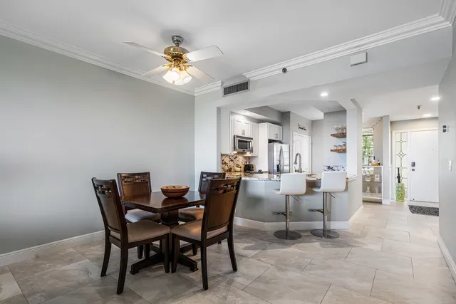 a view of a dining room with furniture