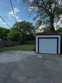 a view of backyard with green space