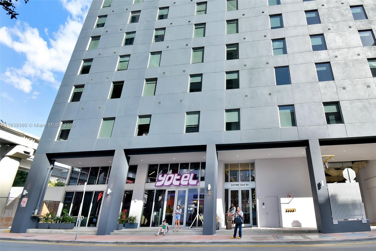 227 Northeast 2nd Street, Unit 2000 Miami, FL 33132 - Photo 31 of 44 a view of a building with a street