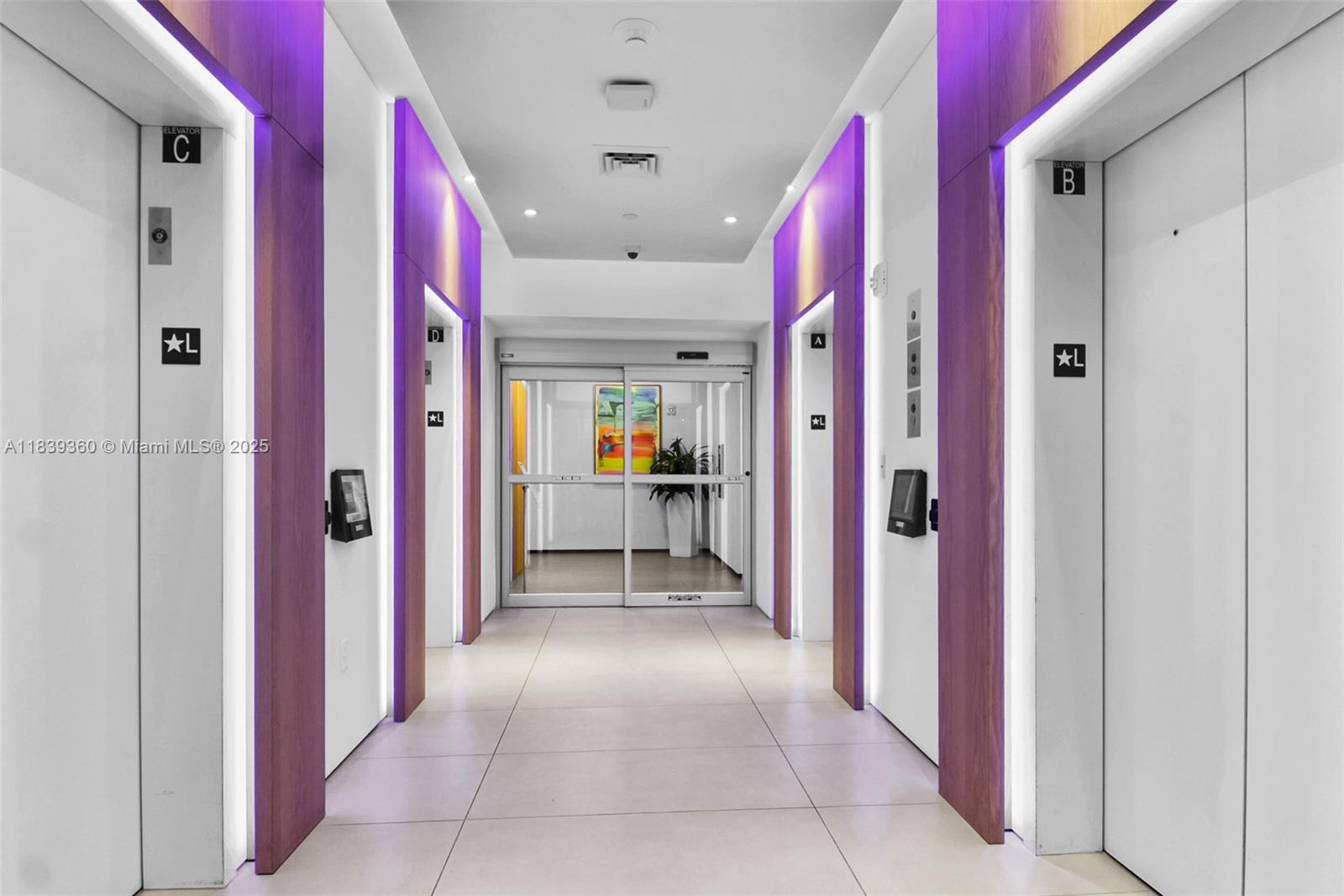 227 Northeast 2nd Street, Unit 2000 Miami, FL 33132 - Photo 36 of 44 a view of a hallway with living room and dining room