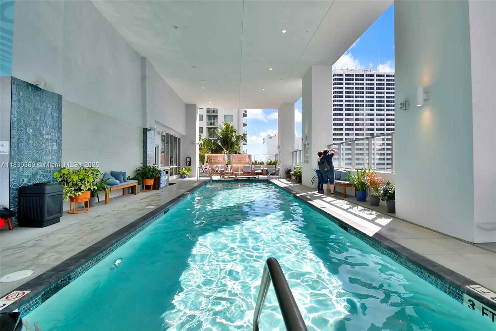 227 Northeast 2nd Street, Unit 2000 Miami, FL 33132 - Photo 37 of 44 a living room with garden