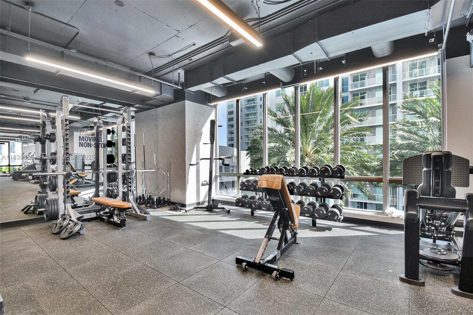 227 Northeast 2nd Street, Unit 2000 Miami, FL 33132 - Photo 43 of 44 a view of a room with gym equipment