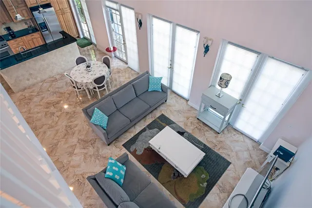 a living room with furniture and a table