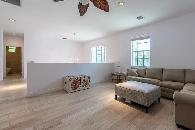 a living room with furniture and window