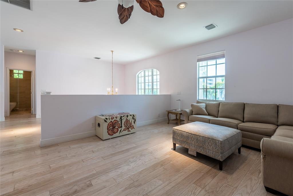 2999 Banyan Road Boca Raton, FL 33432 - Photo 32 of 38 a living room with furniture and window