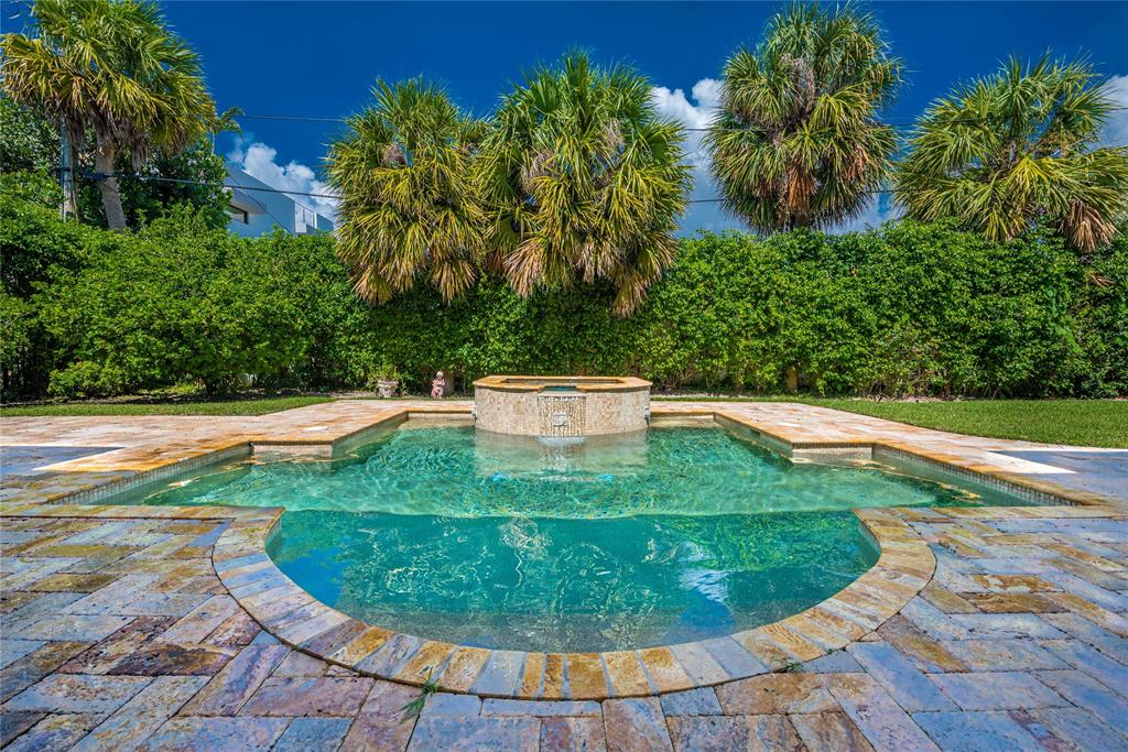 2999 Banyan Road Boca Raton, FL 33432 - Photo 34 of 38 a view of a swimming pool with a yard