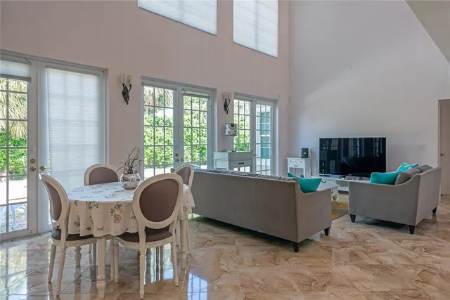 a living room with furniture and a window