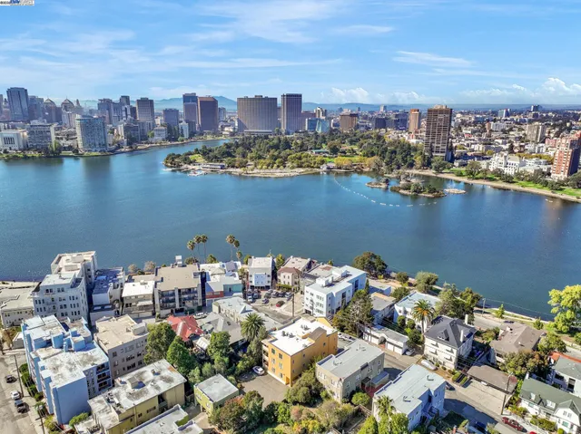 a backyard of a house with outdoor seating
