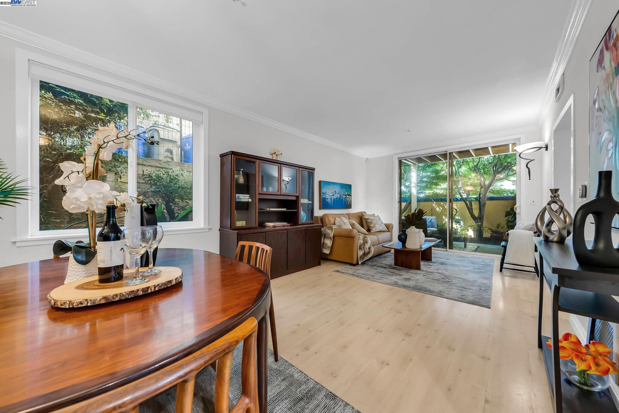 400 Wayne Avenue, Unit 1 Oakland, CA 94606 - Photo 20 of 37 a view of a livingroom with furniture window and outside view