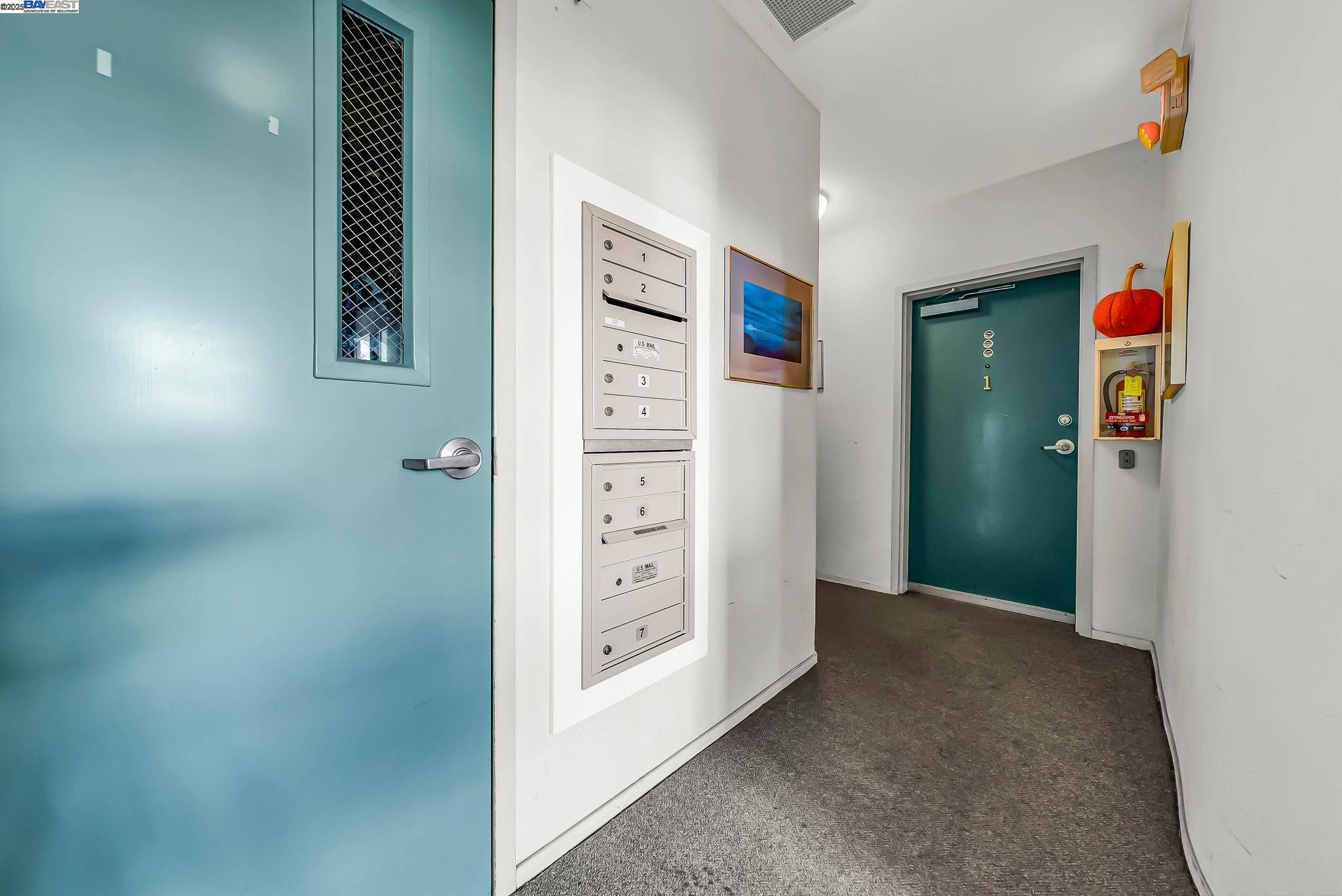 400 Wayne Avenue, Unit 1 Oakland, CA 94606 - Photo 32 of 37 a view of a hallway with closet