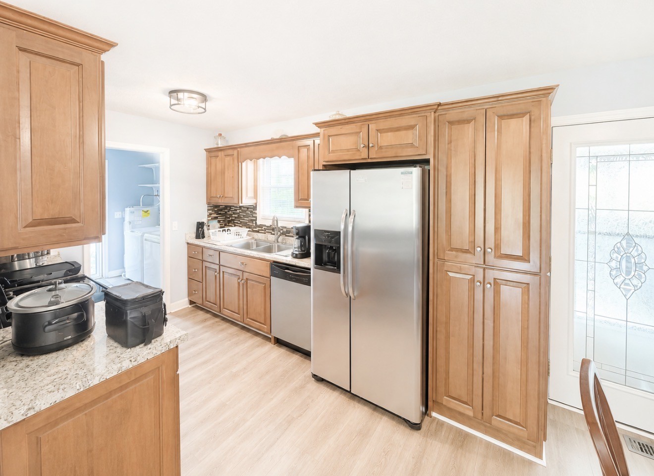 153 Henry Harris Road Westmoreland, TN 37186 - Photo 6 of 18 a kitchen with stainless steel appliances granite countertop a refrigerator and a stove top oven