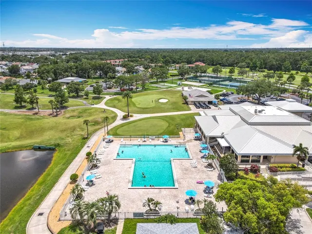 a view of an outdoor space and tennis court