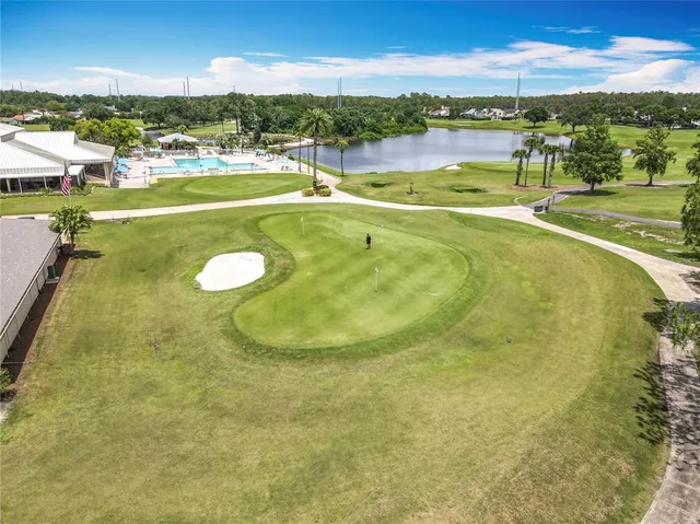 a view of a park with lawn chairs