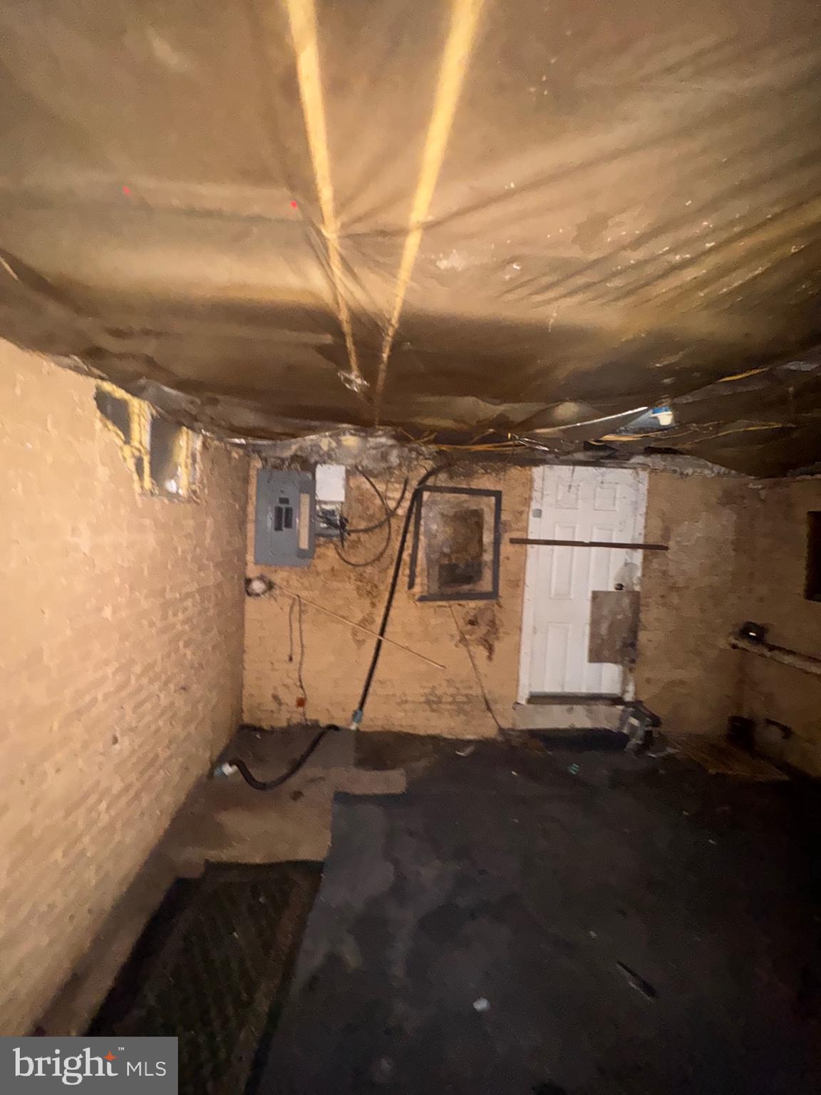 1908 Federal Street Baltimore, MD 21213 - Photo 16 of 18 a view of a garage with wooden floor