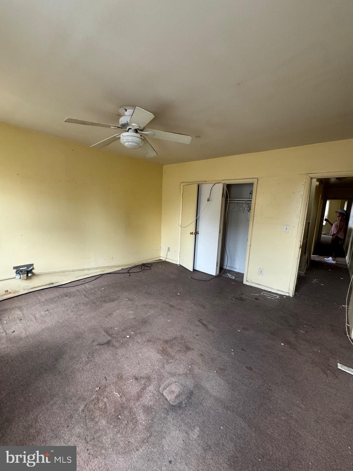 1908 Federal Street Baltimore, MD 21213 - Photo 6 of 18 a view of empty room with ceiling fan and window