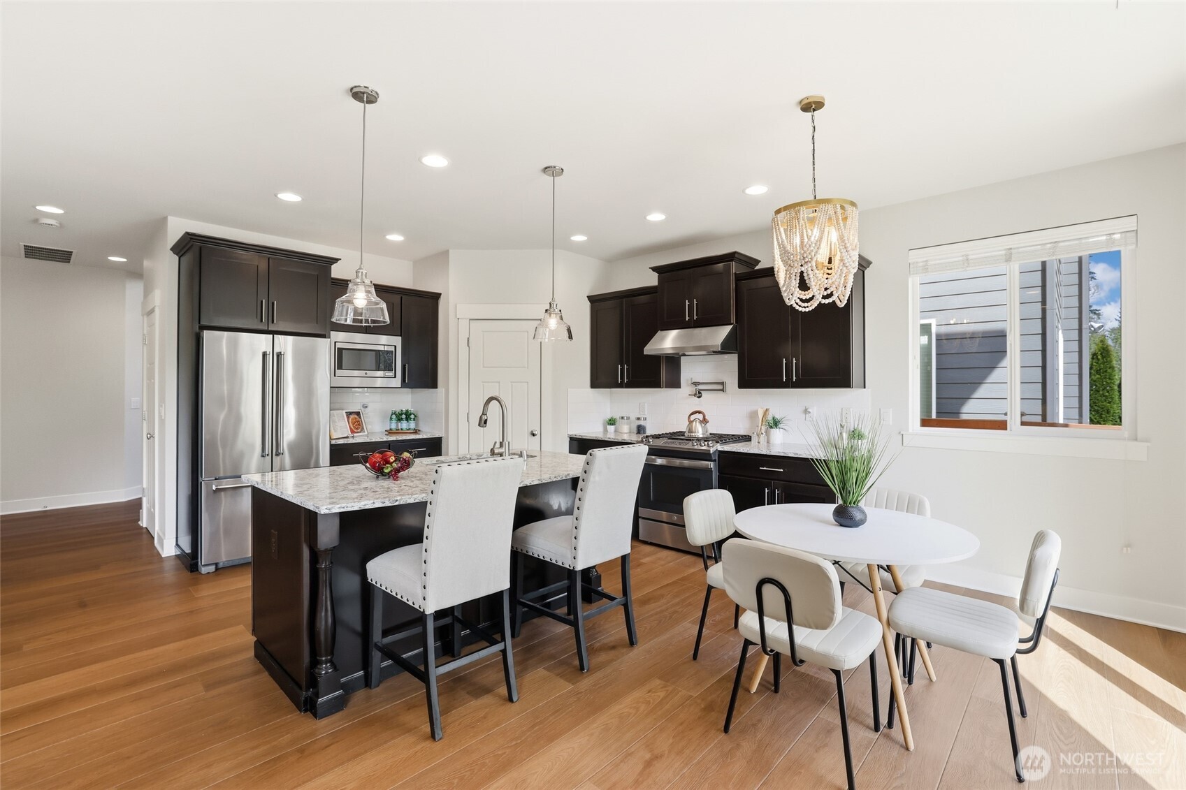 16927 35th Drive Southeast Bothell, WA 98012 - Photo 13 of 38 a view of kitchen with dining table and chairs