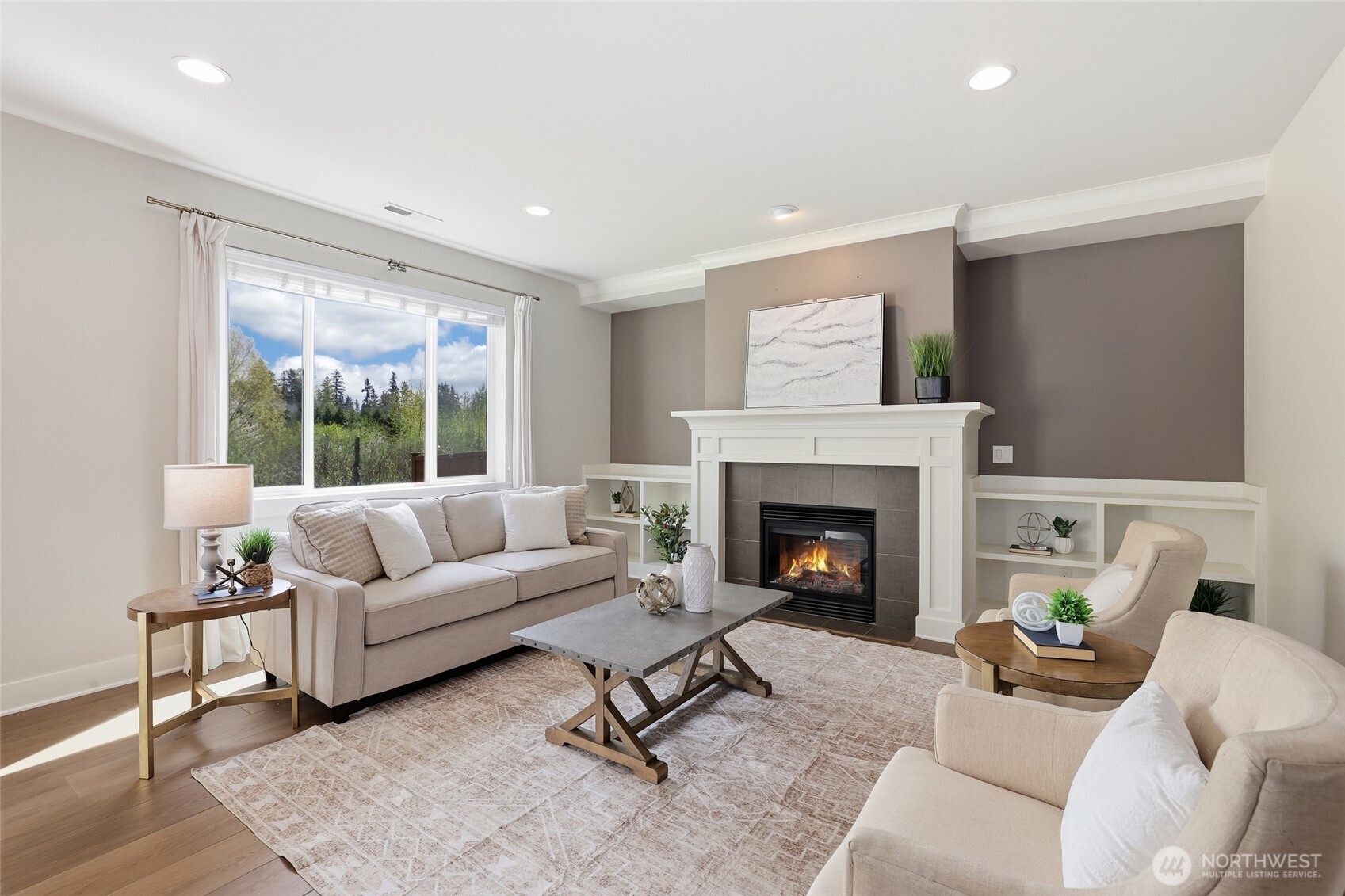 16927 35th Drive Southeast Bothell, WA 98012 - Photo 16 of 38 a living room with furniture a fireplace and a large window