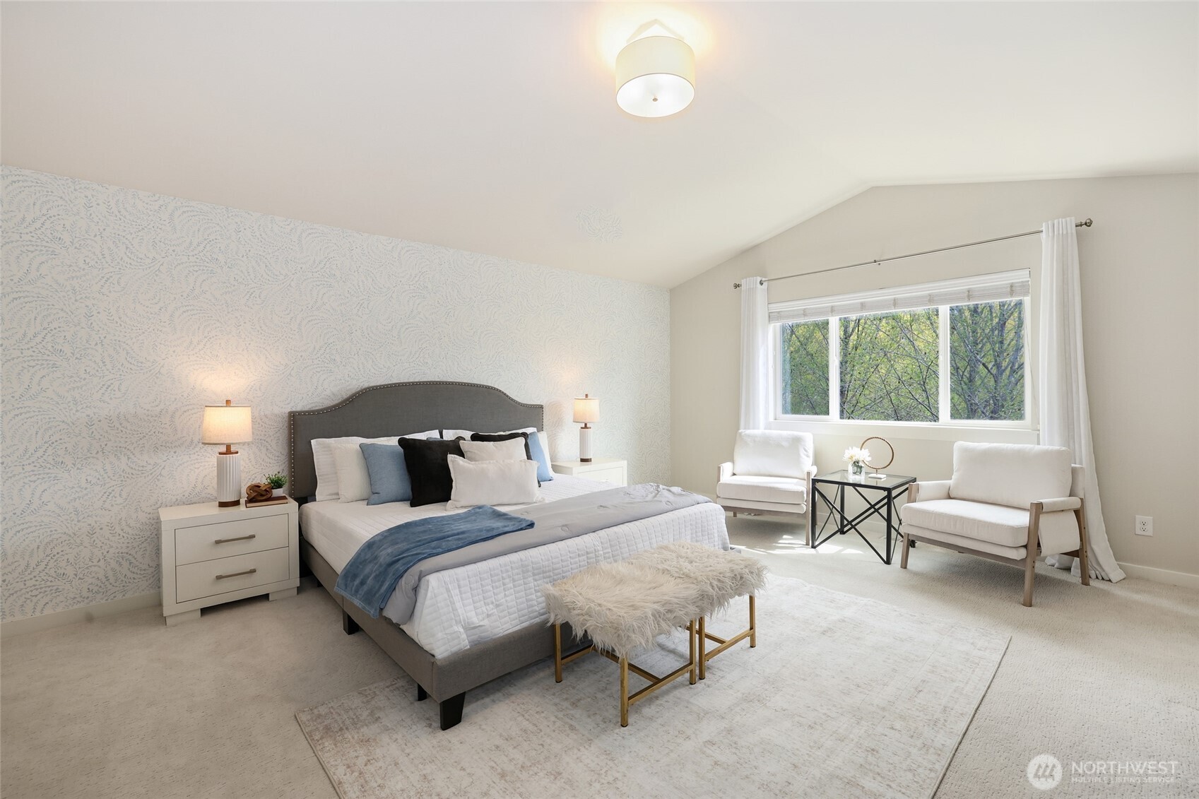 16927 35th Drive Southeast Bothell, WA 98012 - Photo 19 of 38 a spacious bedroom with a bed and a couch