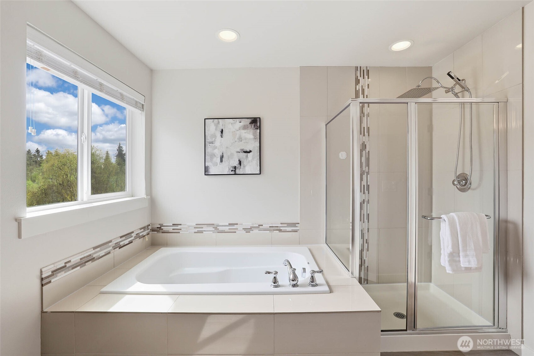 16927 35th Drive Southeast Bothell, WA 98012 - Photo 22 of 38 a bathroom with a bathtub and a shower