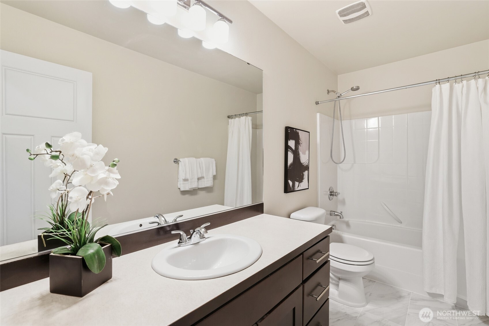 16927 35th Drive Southeast Bothell, WA 98012 - Photo 26 of 38 a bathroom with a granite countertop sink a toilet and shower