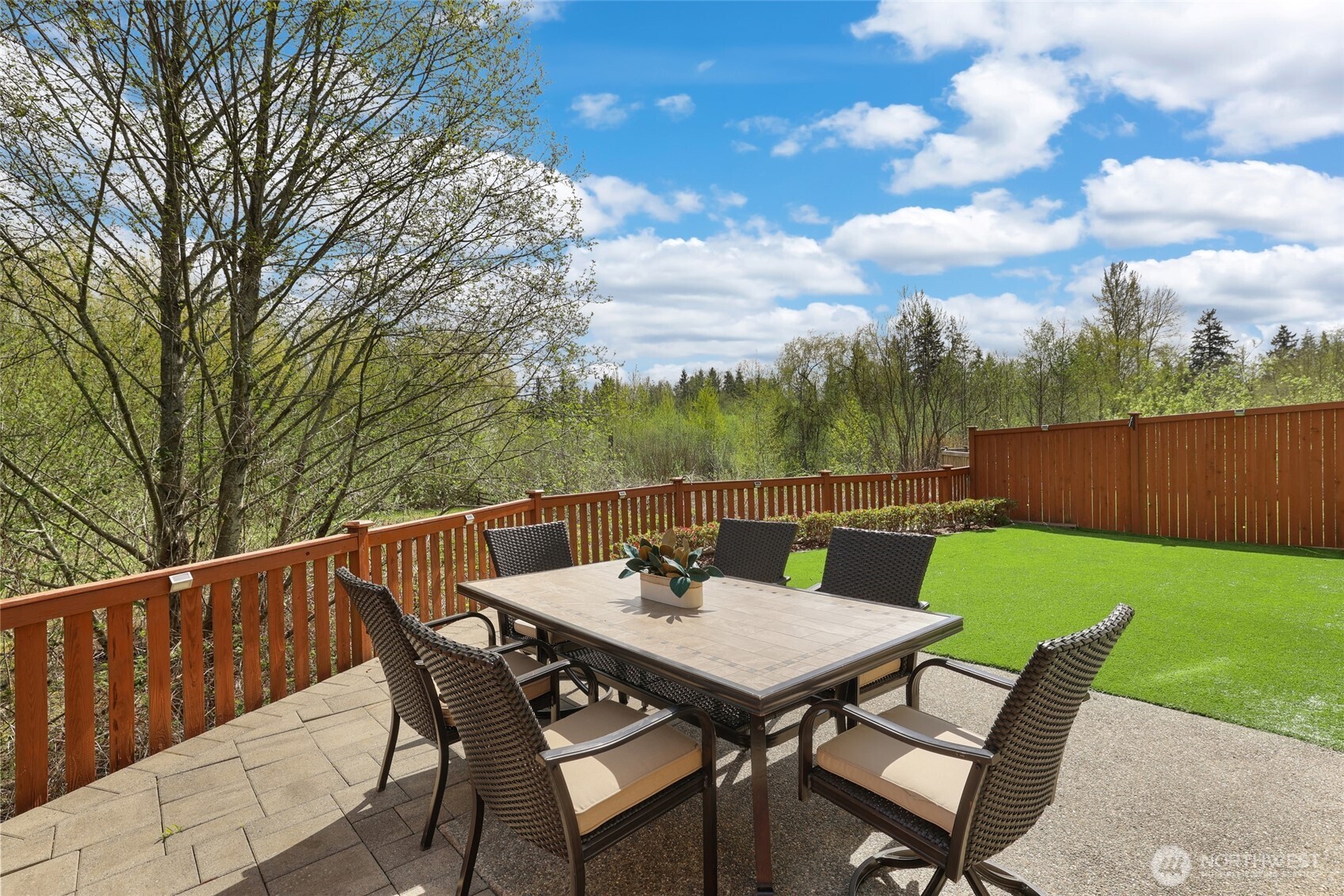 16927 35th Drive Southeast Bothell, WA 98012 - Photo 31 of 38 a view of a table and chairs in the patio