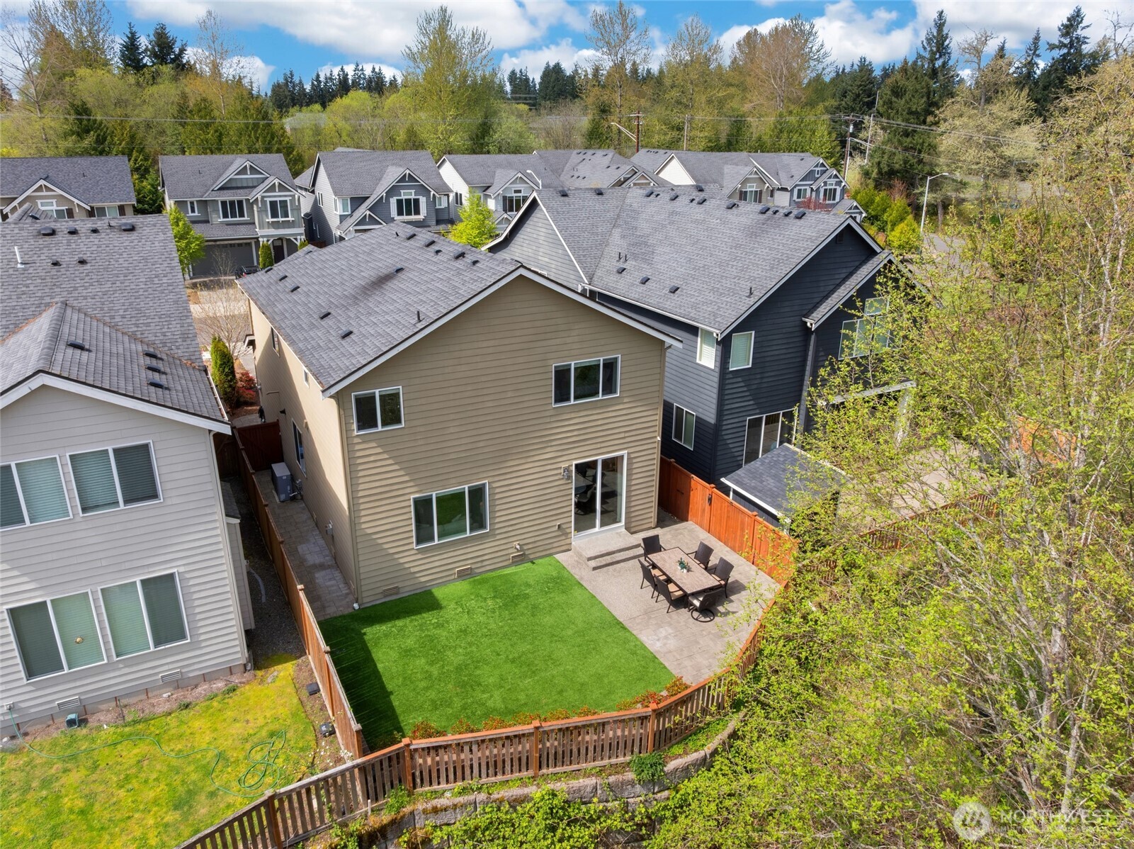 16927 35th Drive Southeast Bothell, WA 98012 - Photo 34 of 38 an aerial view of a house with a yard table and chairs