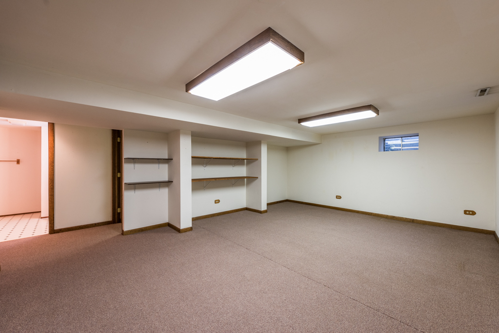 2313 Beck Road Lindenhurst, IL 60046 - Photo 23 of 35 a view of an empty room with a window