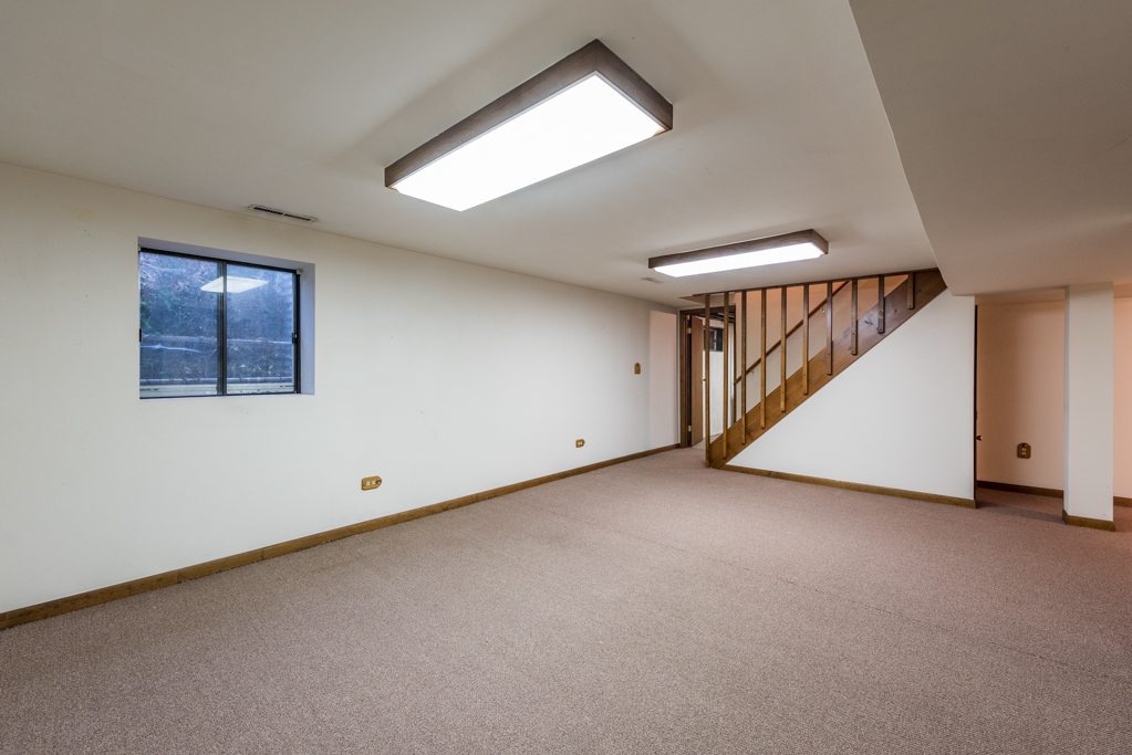 2313 Beck Road Lindenhurst, IL 60046 - Photo 24 of 35 an empty room with windows