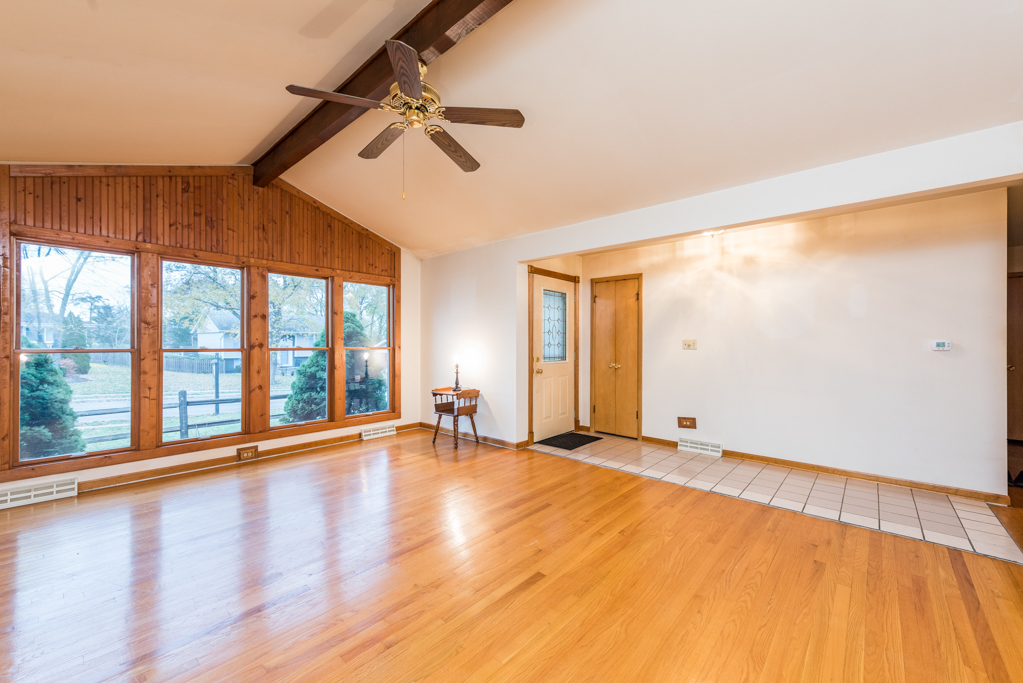 2313 Beck Road Lindenhurst, IL 60046 - Photo 5 of 35 a view of an empty room with a window