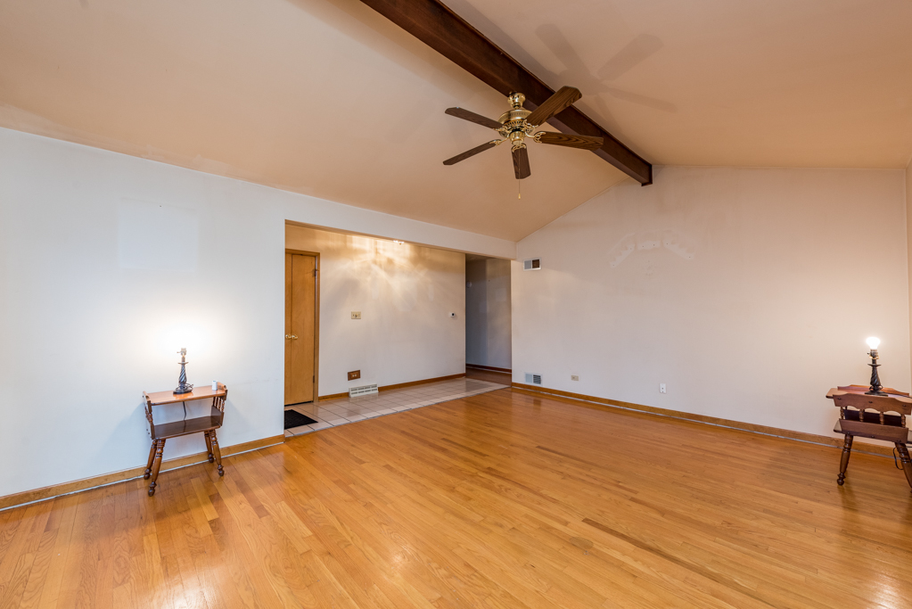 2313 Beck Road Lindenhurst, IL 60046 - Photo 6 of 35 a view of empty room with wooden floor