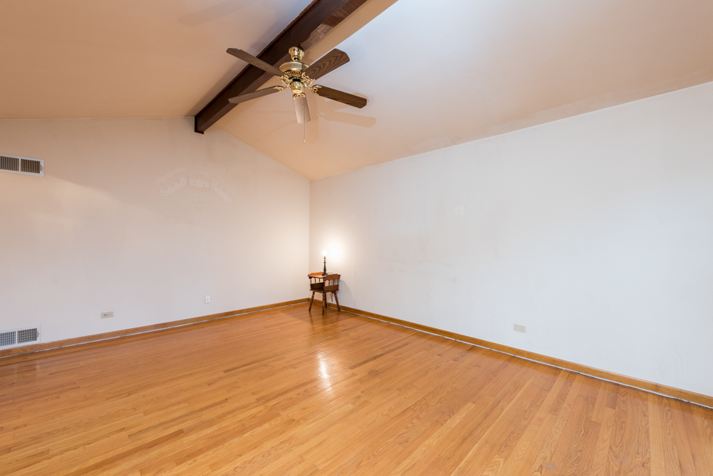 2313 Beck Road Lindenhurst, IL 60046 - Photo 7 of 35 a view of empty room with wooden floor
