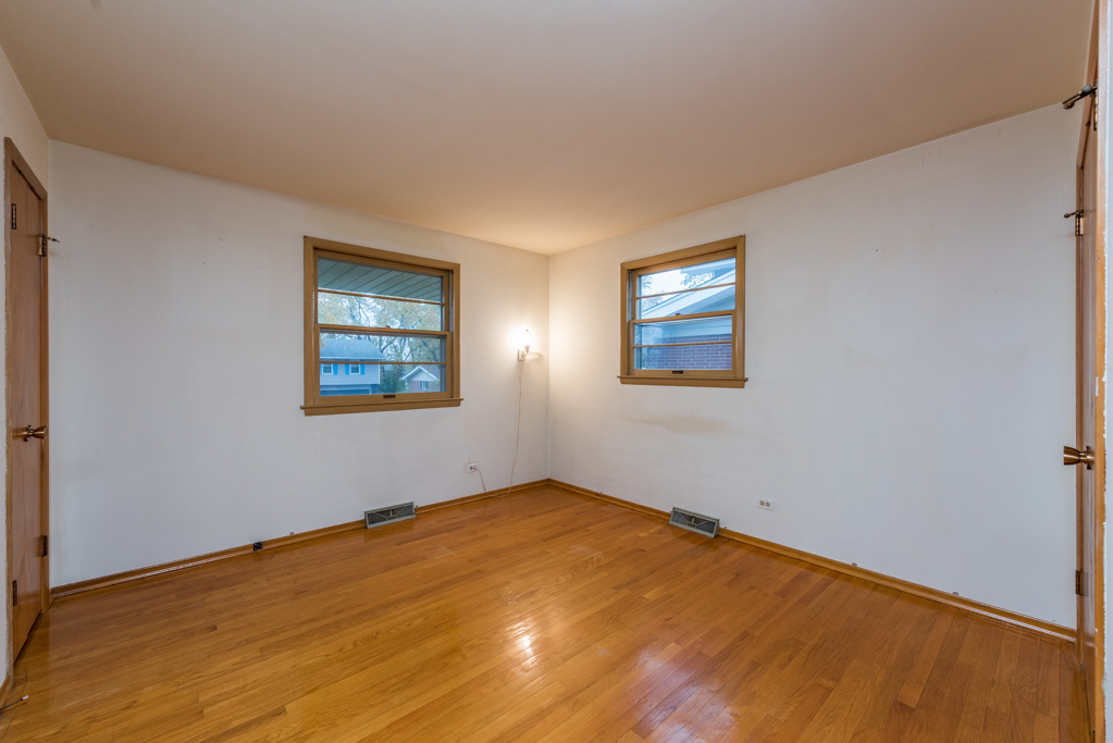 2313 Beck Road Lindenhurst, IL 60046 - Photo 10 of 35 a view of empty room with wooden floor